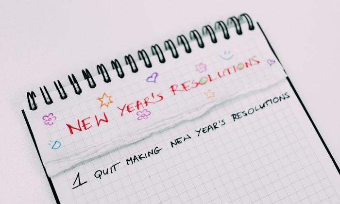 Alt a note book with some text written on it