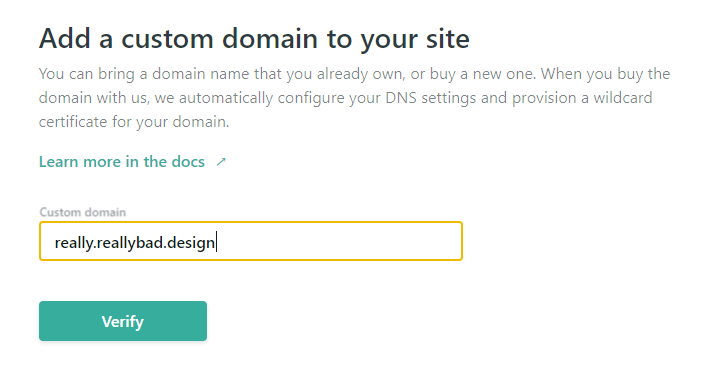 Netlify add custom domain wizard, step 1. A textbox for the domain name and a "Verify" button are shown. "really.reallybad.design" is typed in the box.